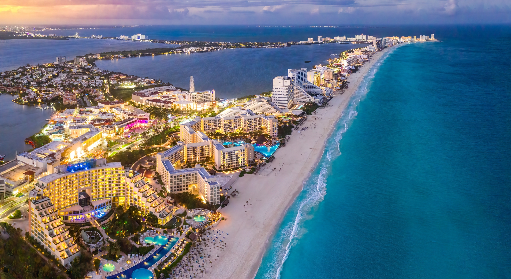 Elegant dining scene showcasing fine cuisine and vibrant nightlife in Cancun, Mexico, with a lively atmosphere.