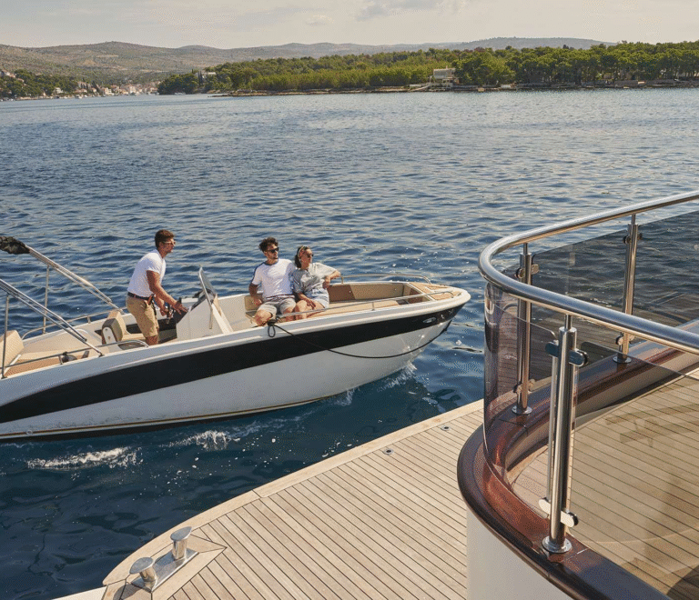 Superyacht tender picks up guests on ANIMA MARIS